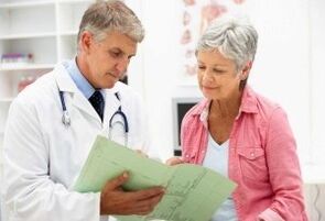 A woman with arthritis at a doctor's appointment